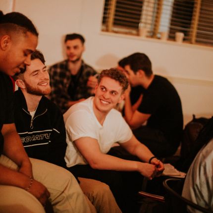 a group of heart church people mingling